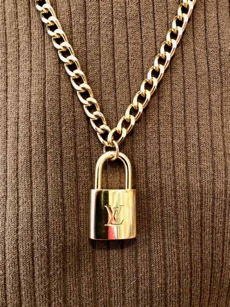 louis vuitton lock necklace gold|louis vuitton vintage lock necklace.